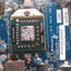 Close-up of a computer motherboard with various components.