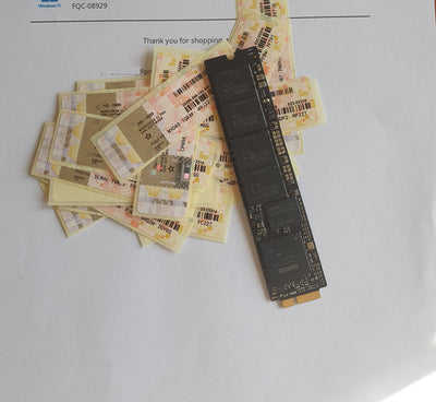 Computer memory module on a surface with printed materials