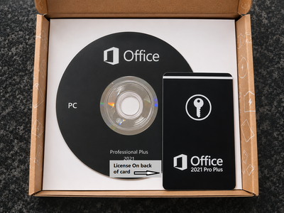 An open cardboard box containing an Office 2021 Professional Plus license card and a branded black disc, photographed from above on a dark textured surface.