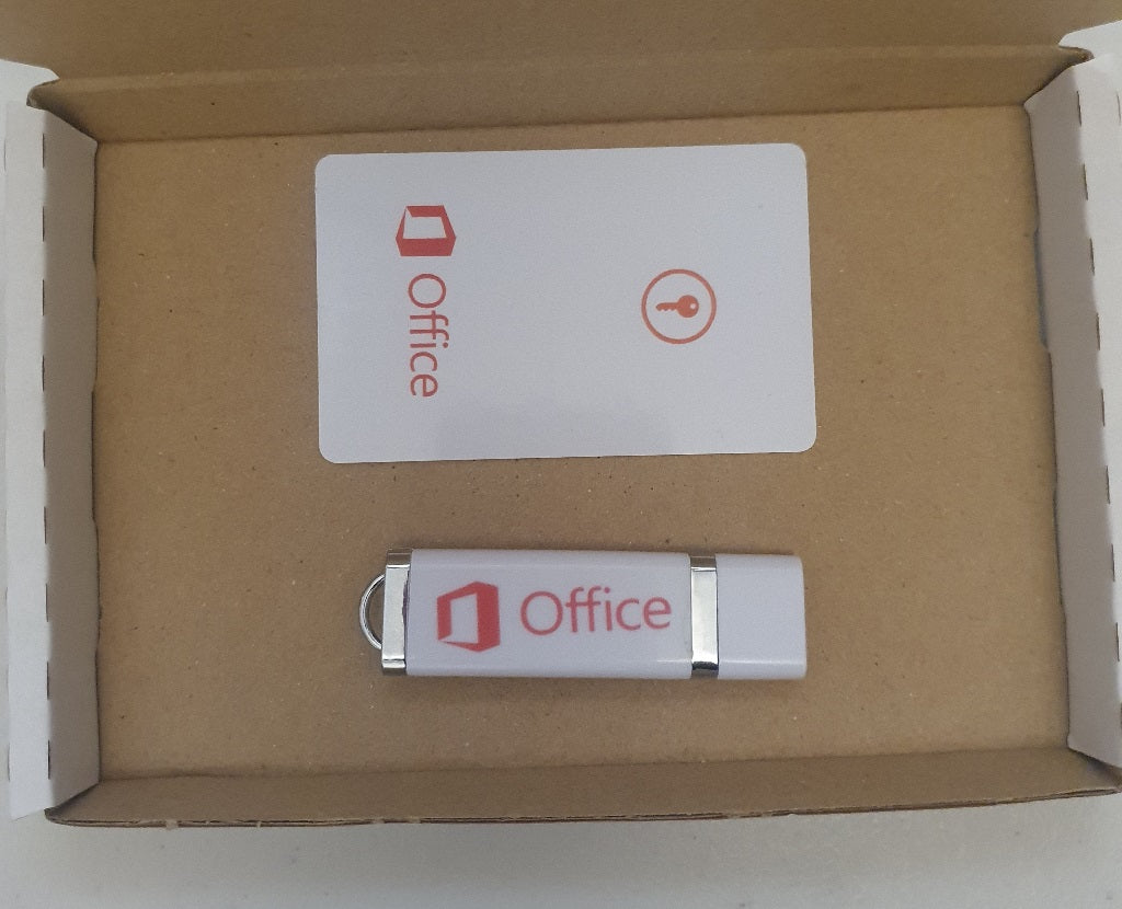 USB drive with Office branding on a cardboard surface