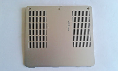 Silver RAM memory cover for Dell XPS 15 laptop, showing the back side with multiple ventilation holes.