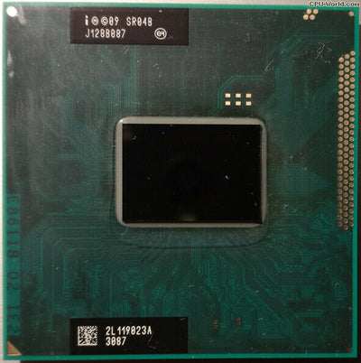 An Intel Core i5 Mobile i5-2410M 2.3GHz Socket G2 (rPGA988B) SR04B TURBO 988-pin CPU with a black heatsink and a green circuit board.