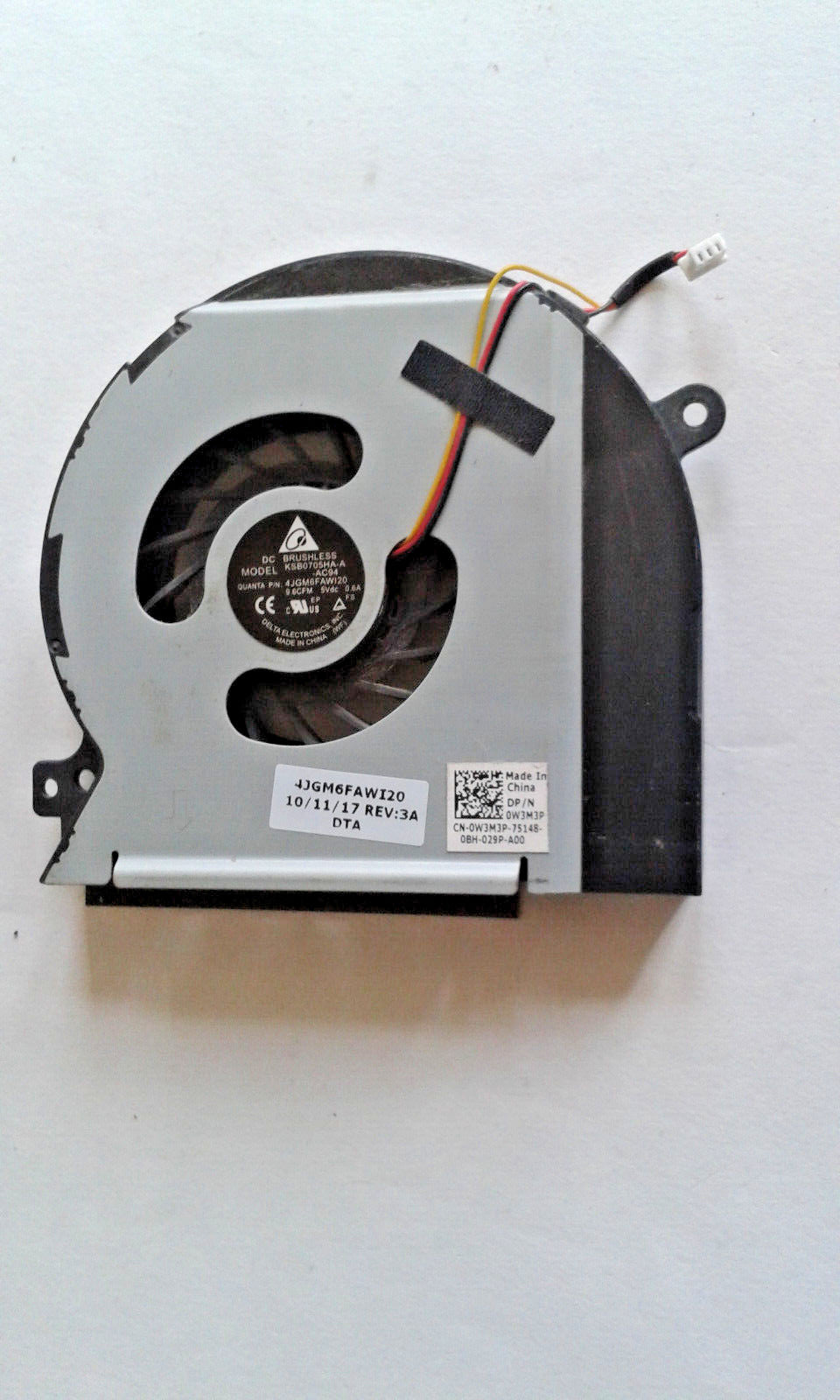 Dell XPS 15 L501X L502X CPU cooling fan with part number 0W3M3P, displaying the back of the fan with wires and the brand logo.